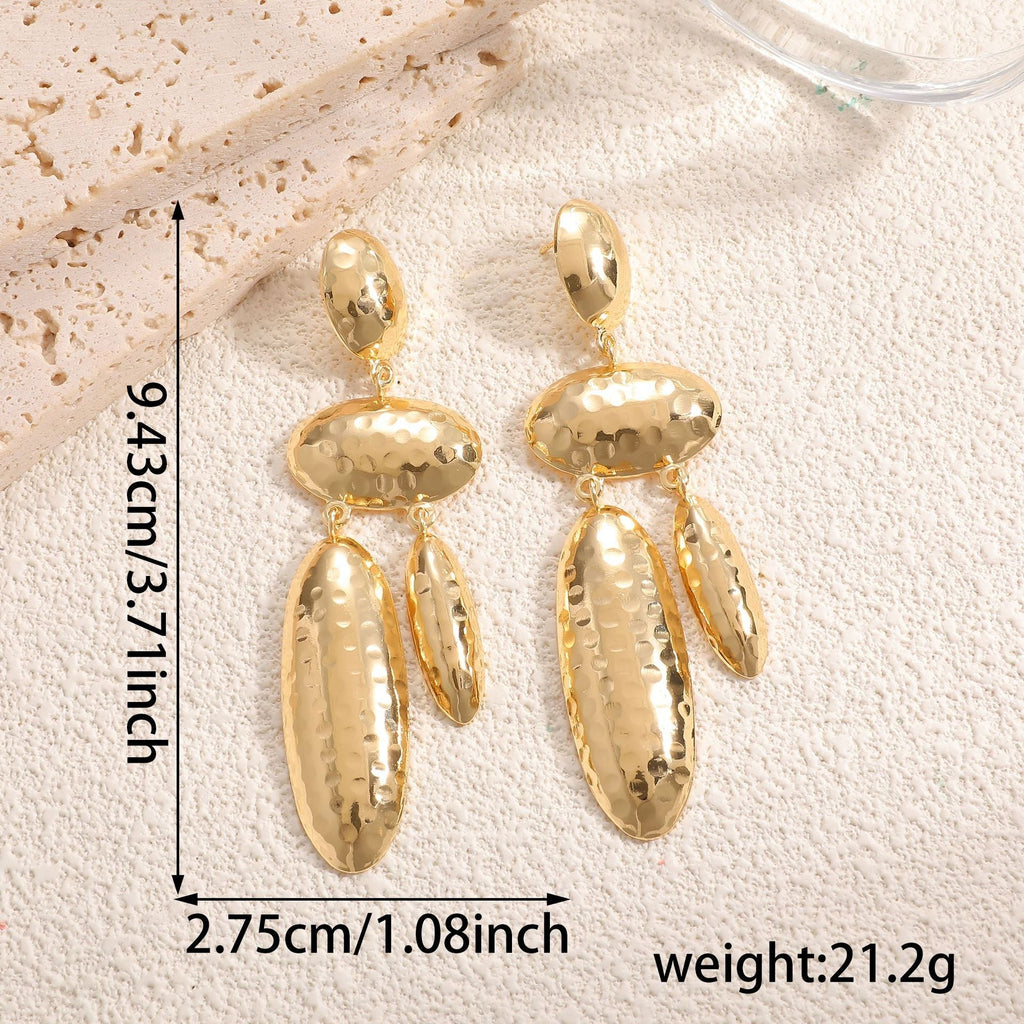 Women Hanging Earrings with artistic, three-dimensional design