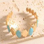 Ladies Open Bangle made of noble metal with elegant motif
