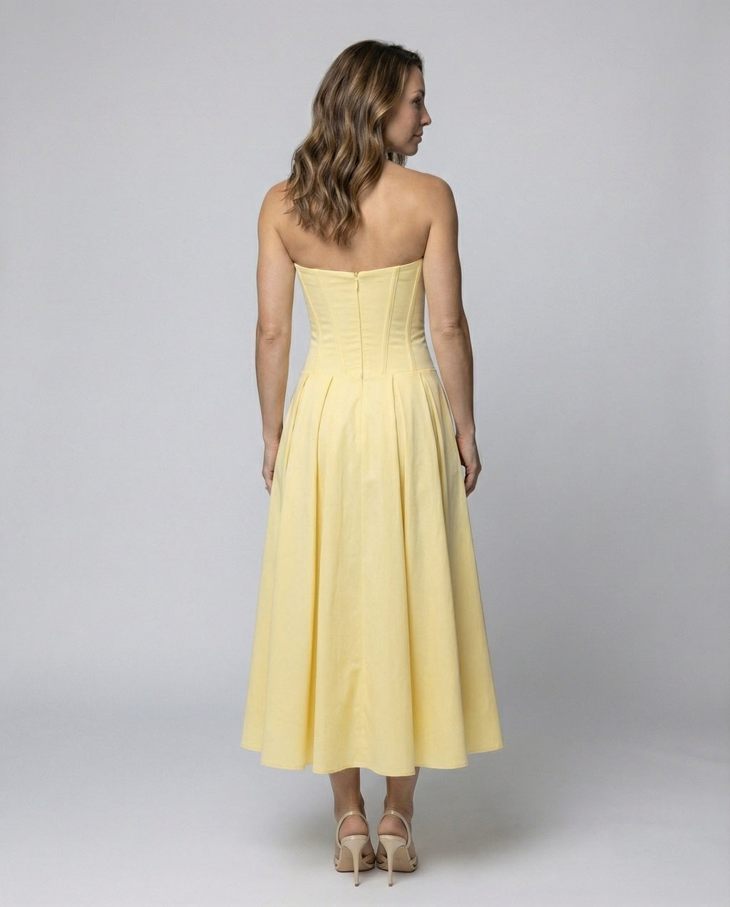 Women's evening dress with deep V-neck and flared skirt - back view