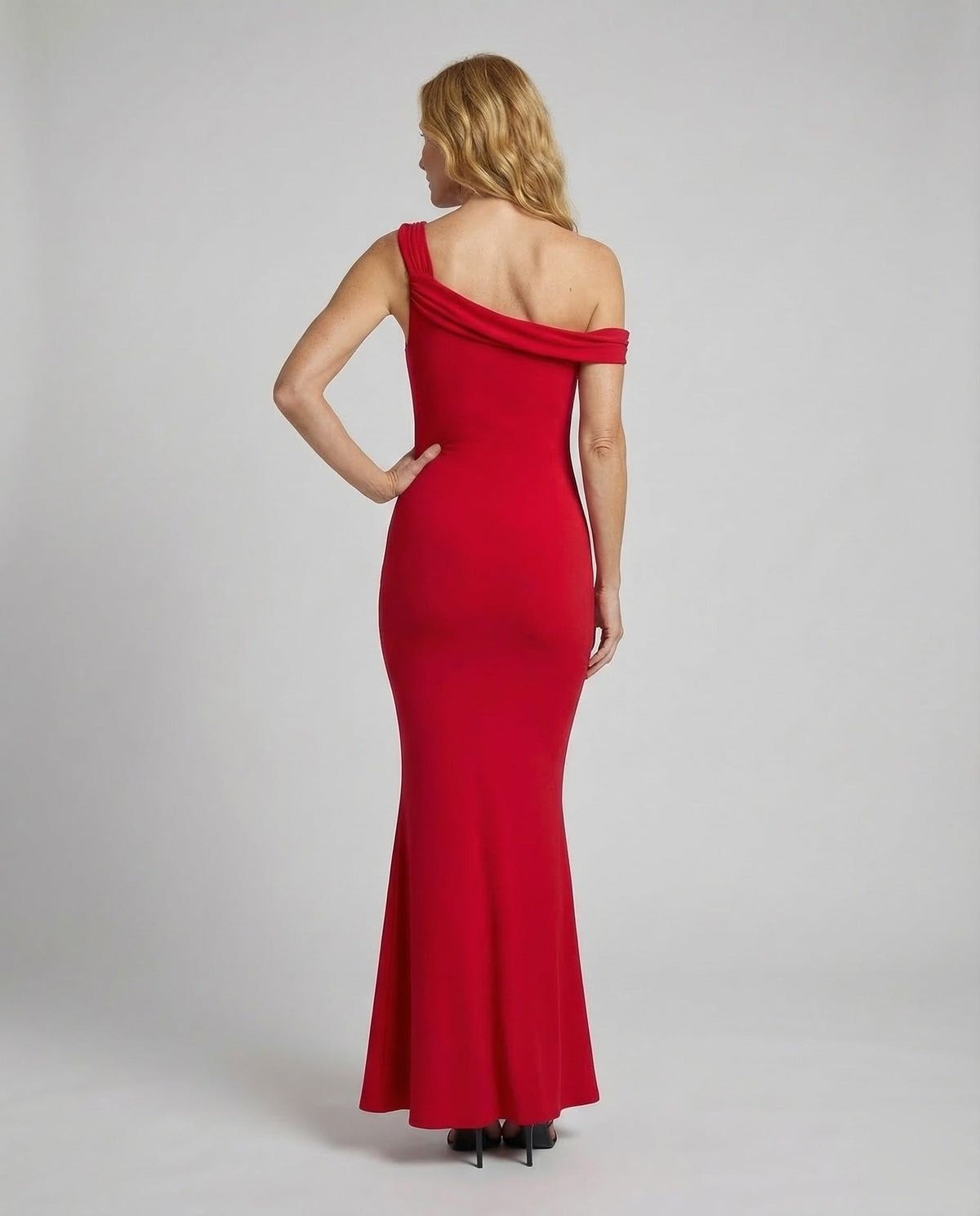 Elegant evening dress asymmetrical in mermaid style - back view