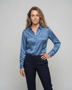 Women's short-cut blouse jacket. - upper body view