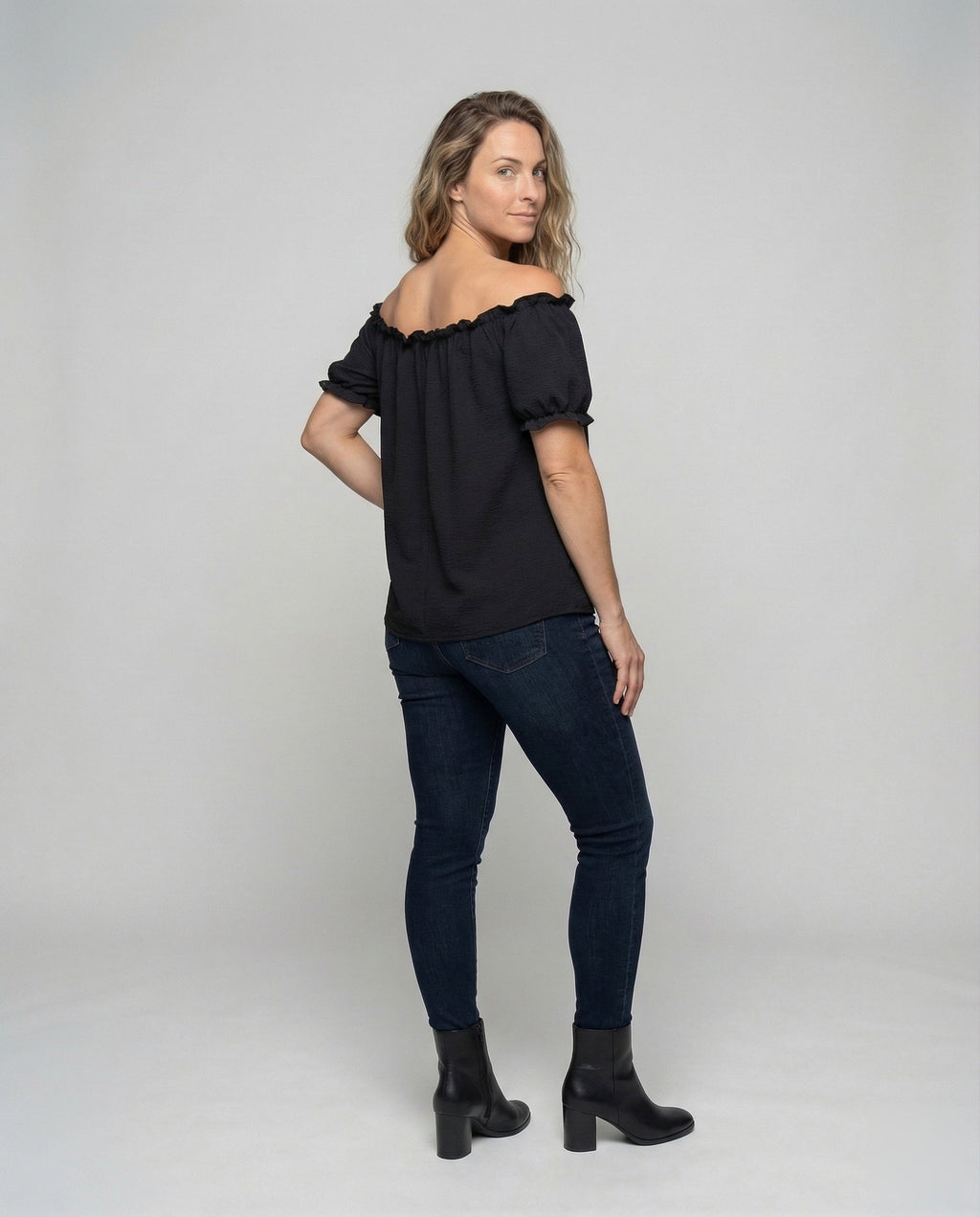Women's casual Carmen blouse top. - back view