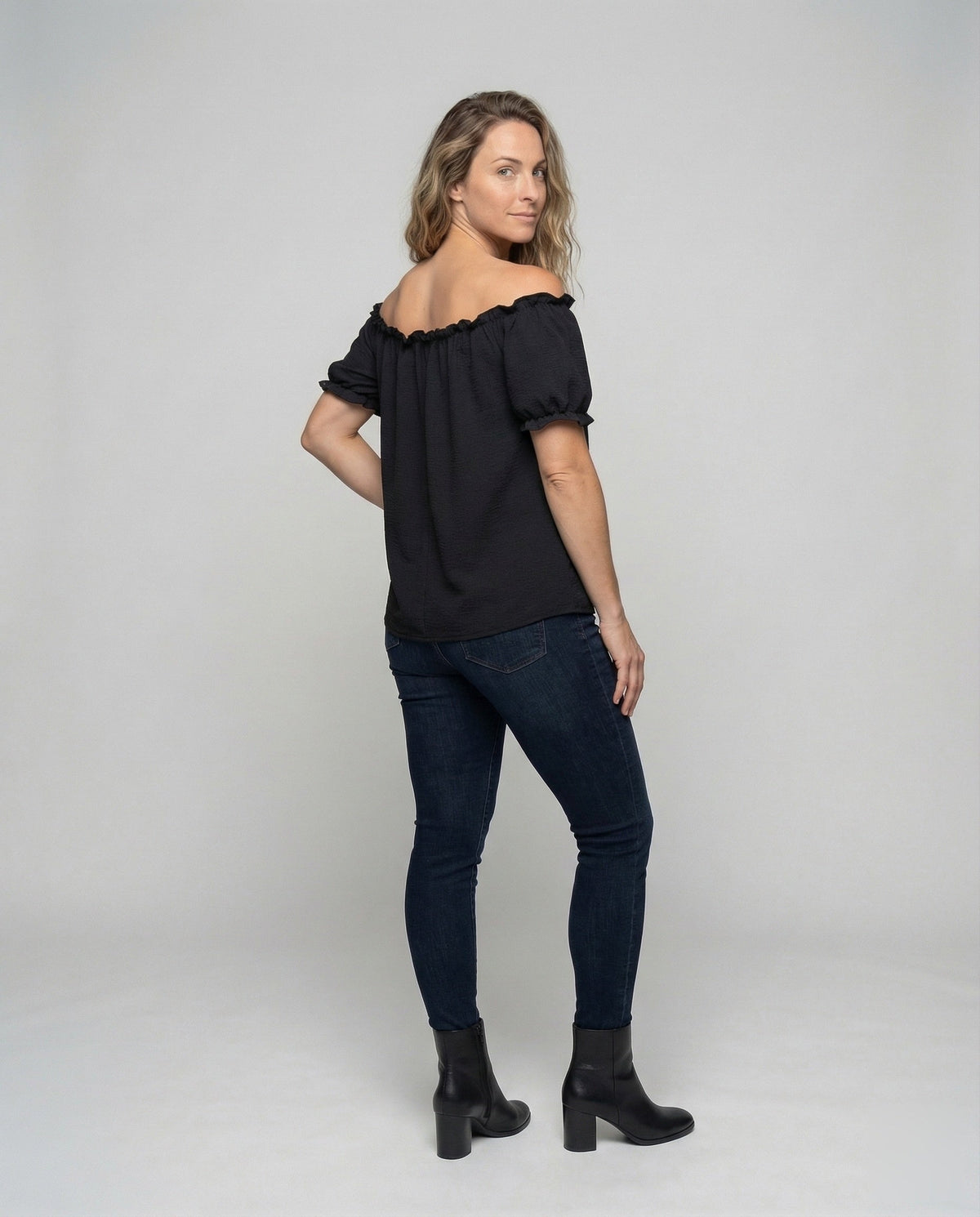 Women's casual Carmen blouse top. - back view
