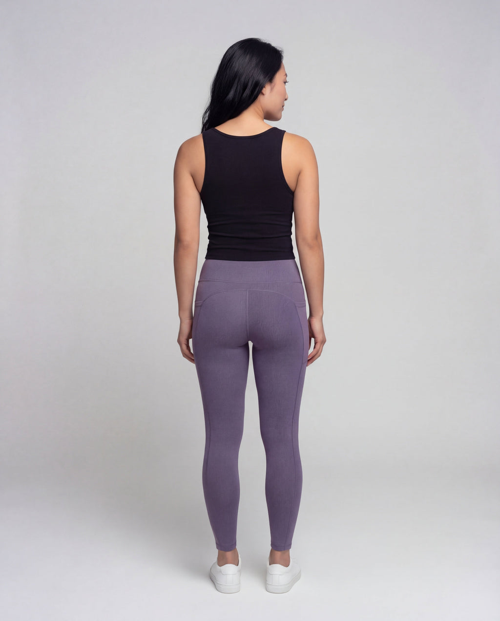 Women's high-waisted yoga leggings with crossover detail - back view