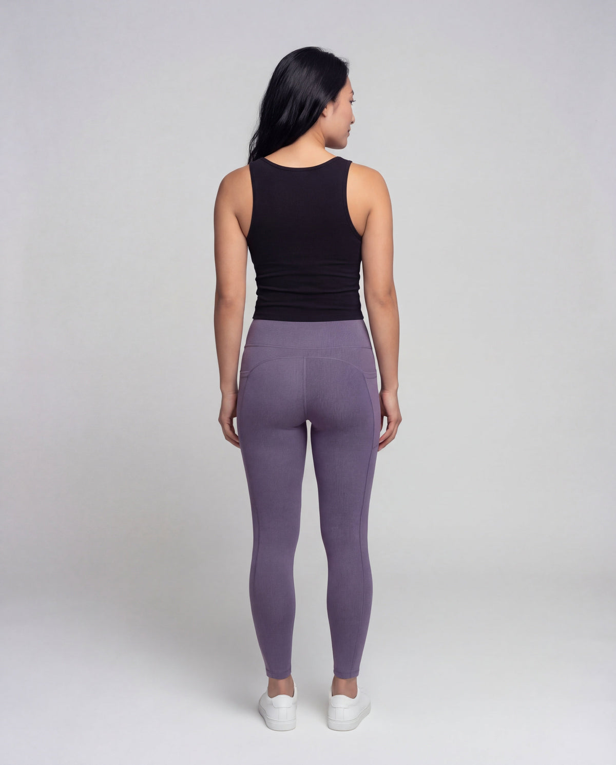 Women's high-waisted yoga leggings with crossover detail - back view