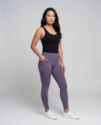 Women's high-waisted yoga leggings with crossover detail - front view
