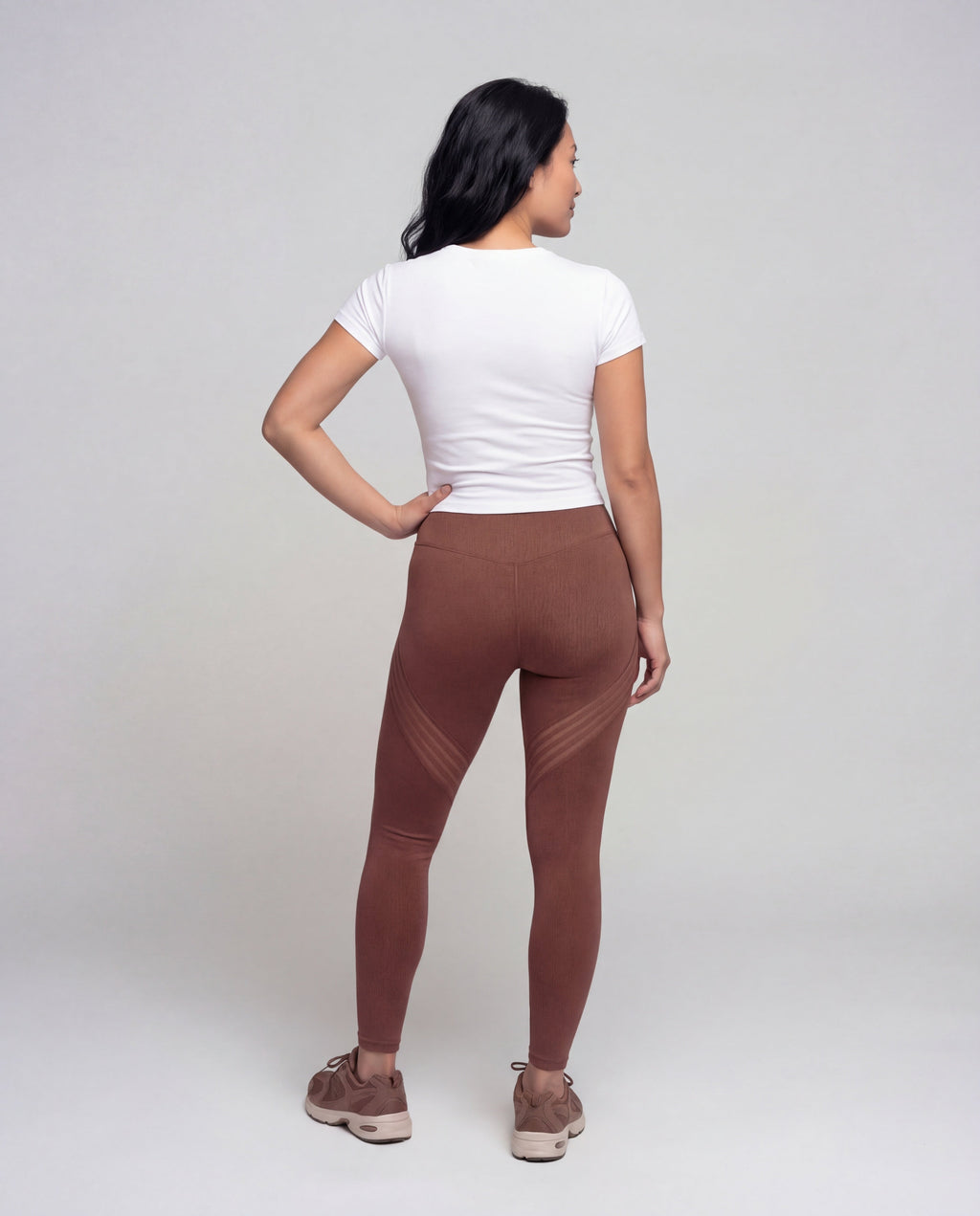Women's high-waisted yoga leggings with mesh inserts - back view