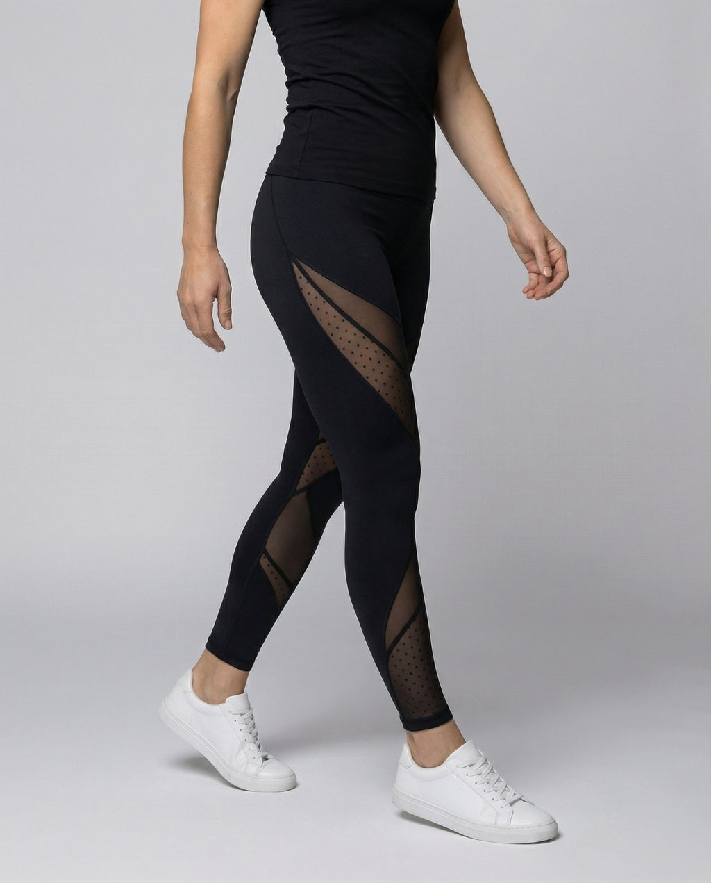 Women's leggings with diagonal mesh inserts - lower body view
