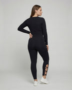 Women's waist-sculpting leggings with strap detail - back view