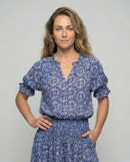 Women's tiered flounce blouse-skirt set - upper body view