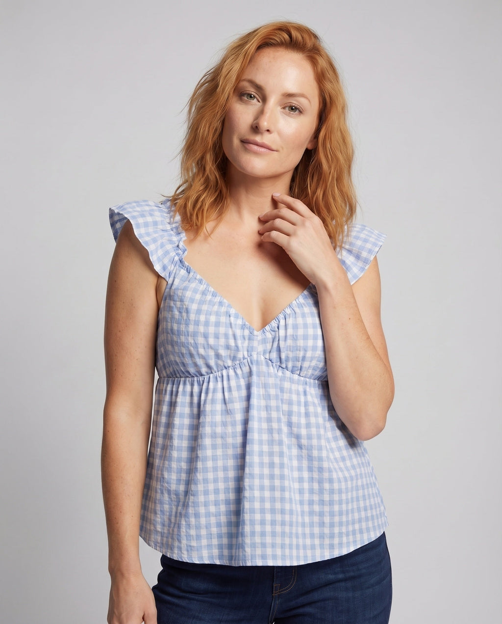 Women's blouse shirt with decorative ruffles and V-neck - upper body view