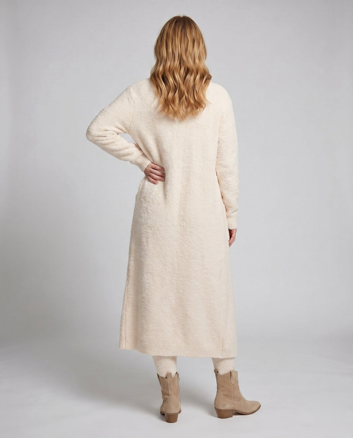 Women's knitted lounge set with refined crop top and wide leg pants - back view