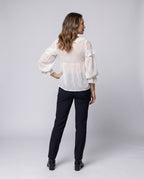 Women airy blouse shirt with ruffled hem and puff sleeves - back view
