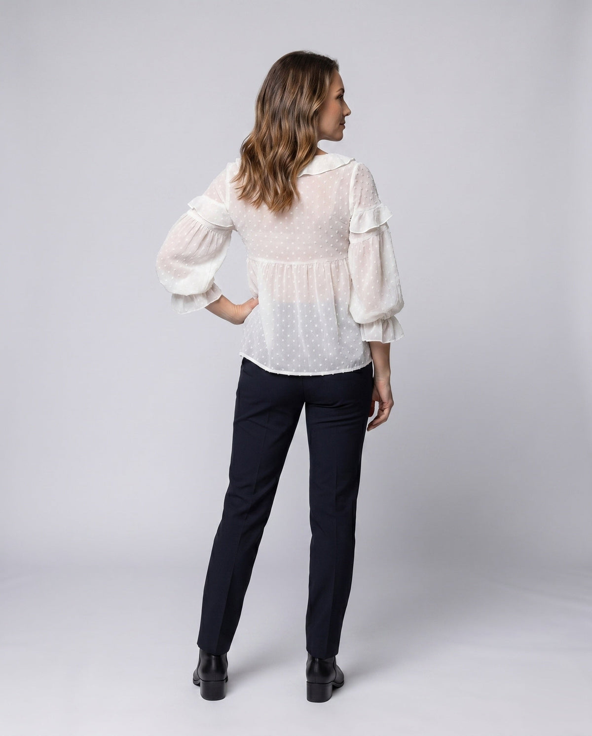 Women airy blouse shirt with ruffled hem and puff sleeves - back view