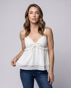 Women's airy blouse top with ruffle details and stylish drawstring - upper body view