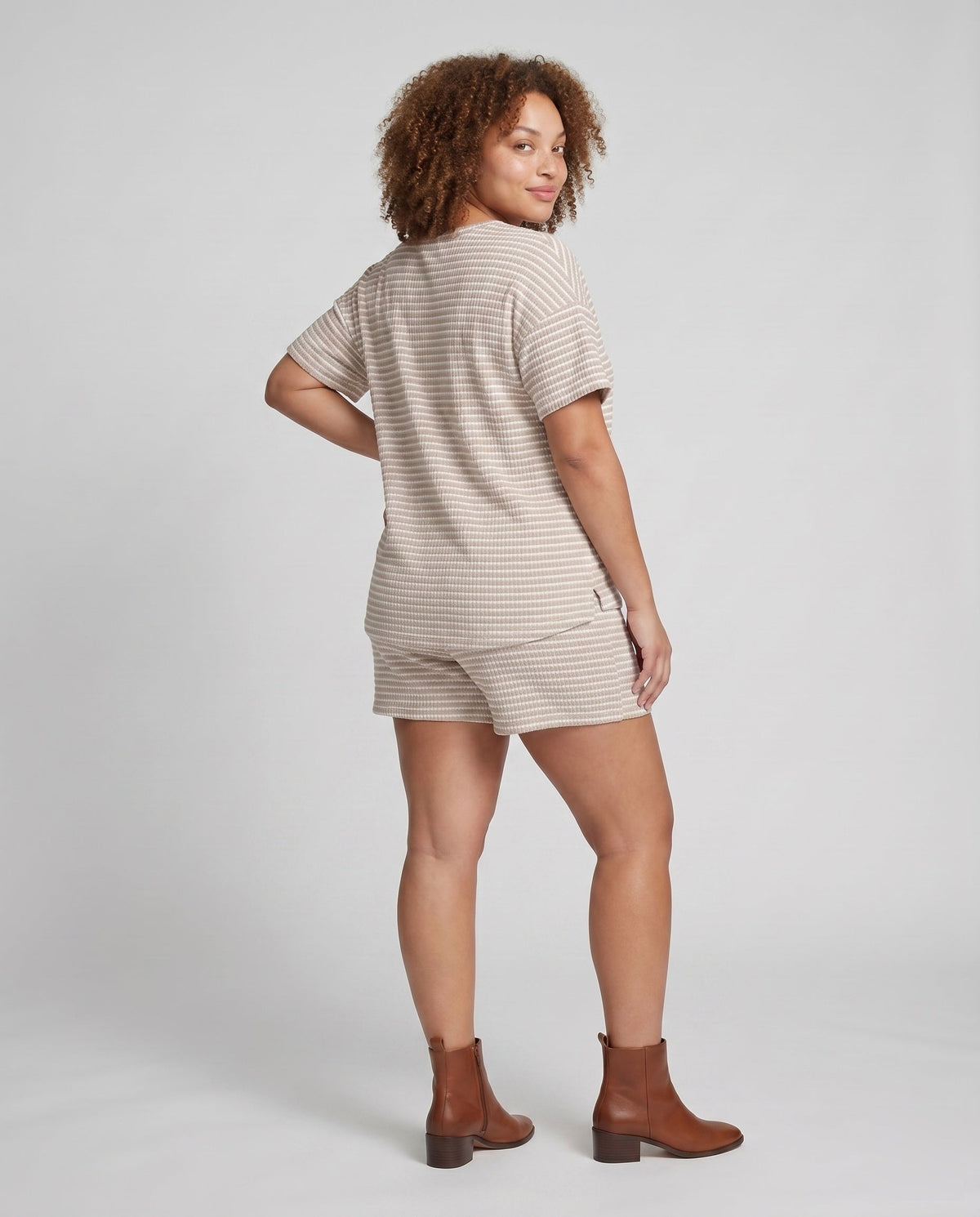 Women's fashionable leisure set with striped top and shorts - back view