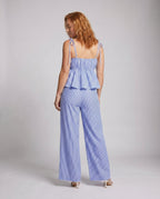 Women's two-piece set with lace top and wide trousers - back view