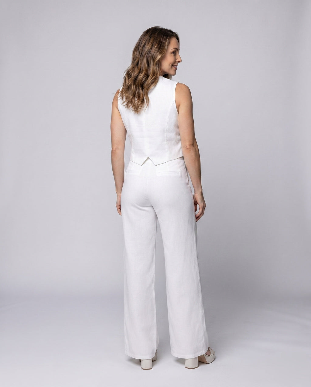 Women Elegant Set with Sleeveless Blazer and Wide Pants All Fashion - back view
