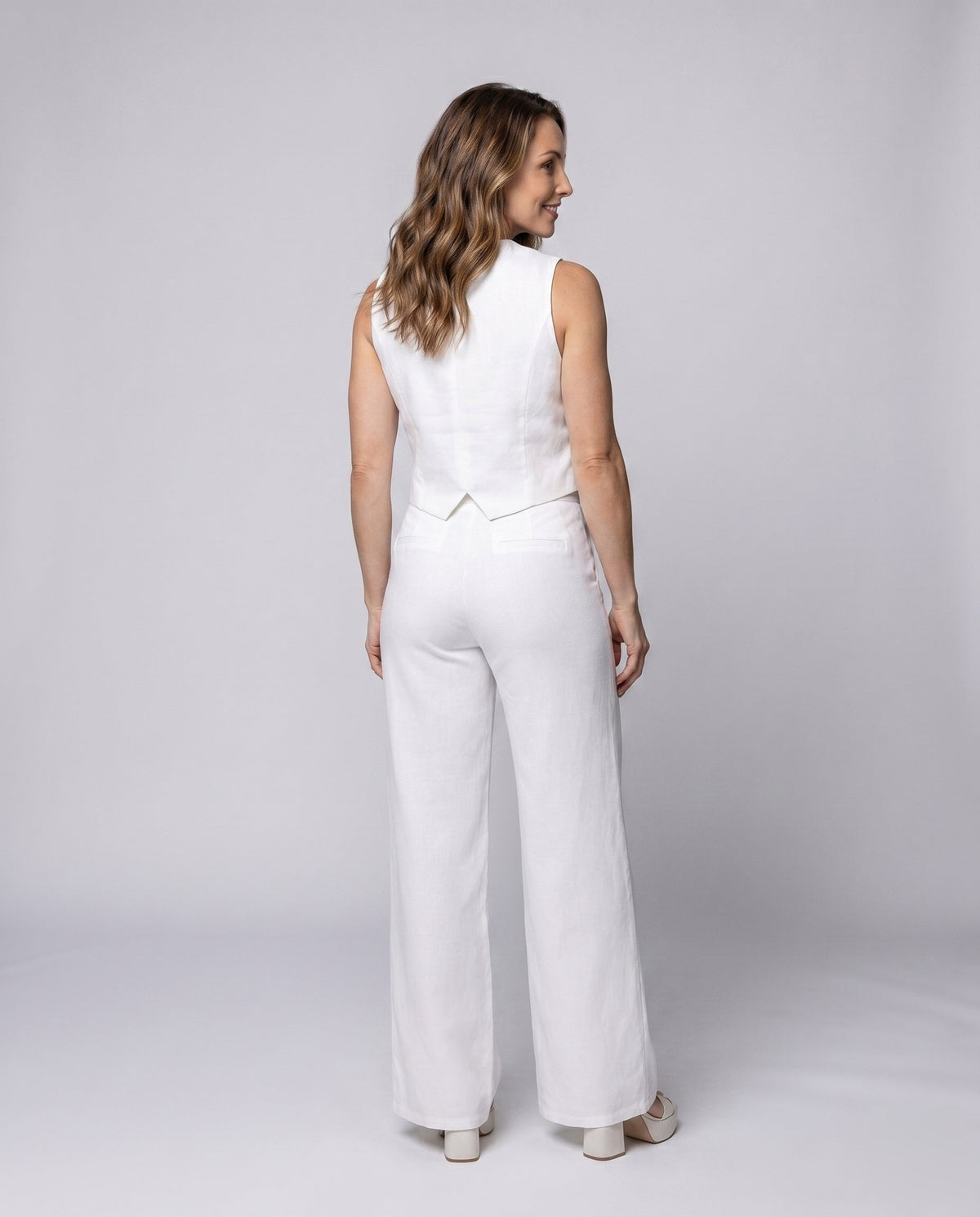 Women Elegant Set with Sleeveless Blazer and Wide Pants All Fashion - back view