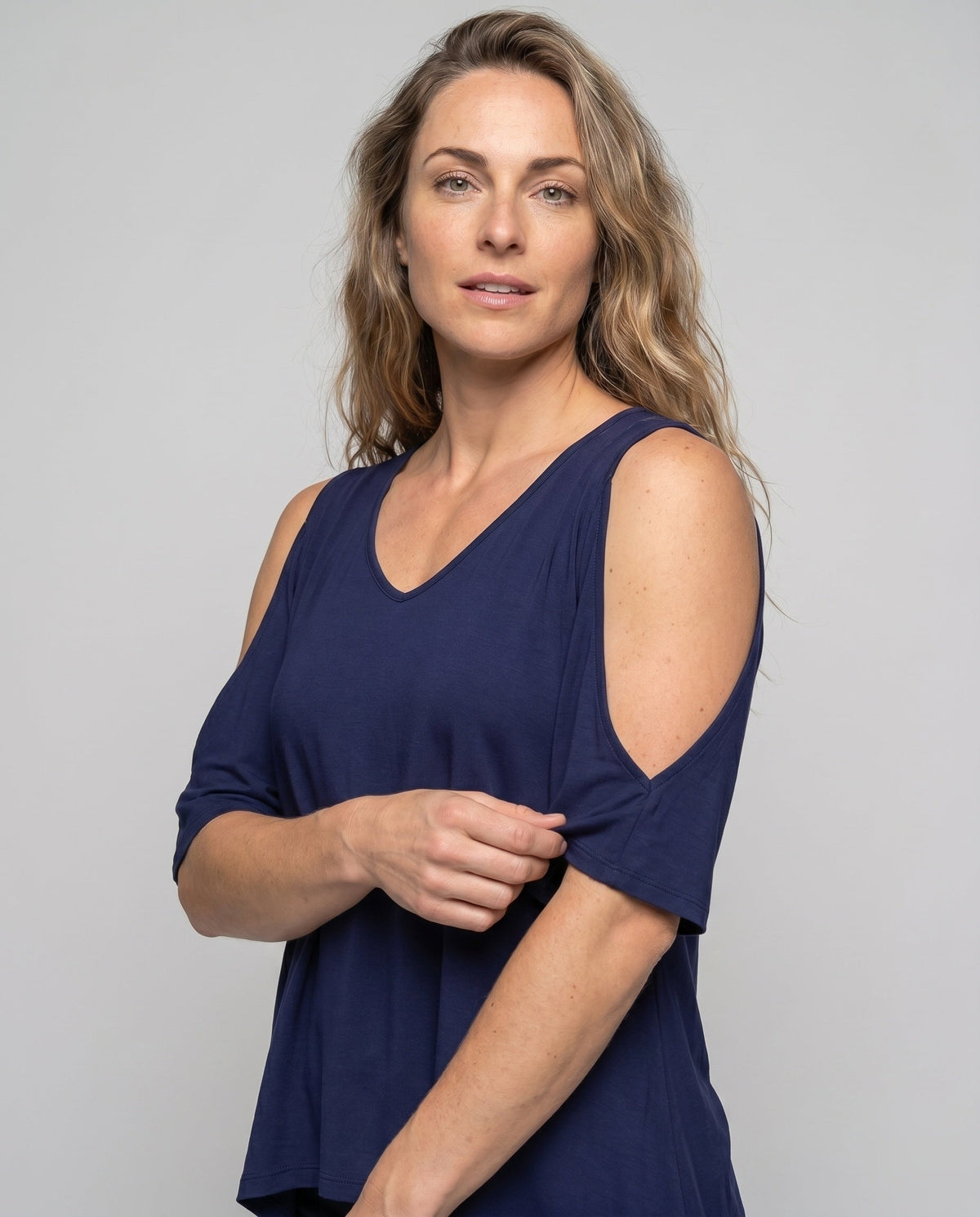Women's casual blouse shirt with special shoulder cutouts and swinging hem All Fashion - upper body view