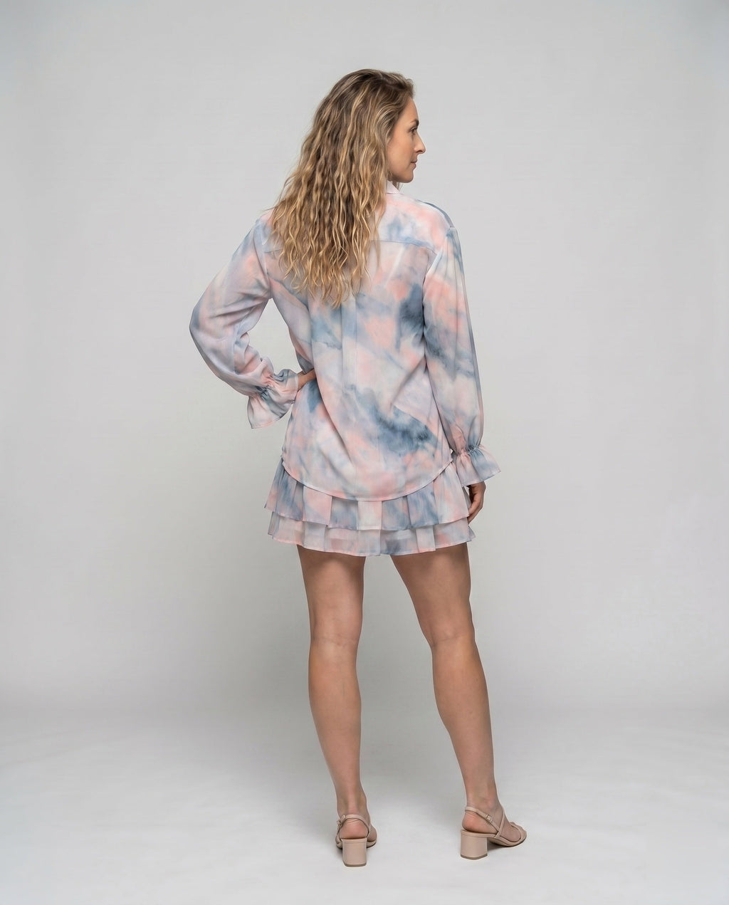 Women airy blouse set with voluminous sleeves and pleated skirt - back view