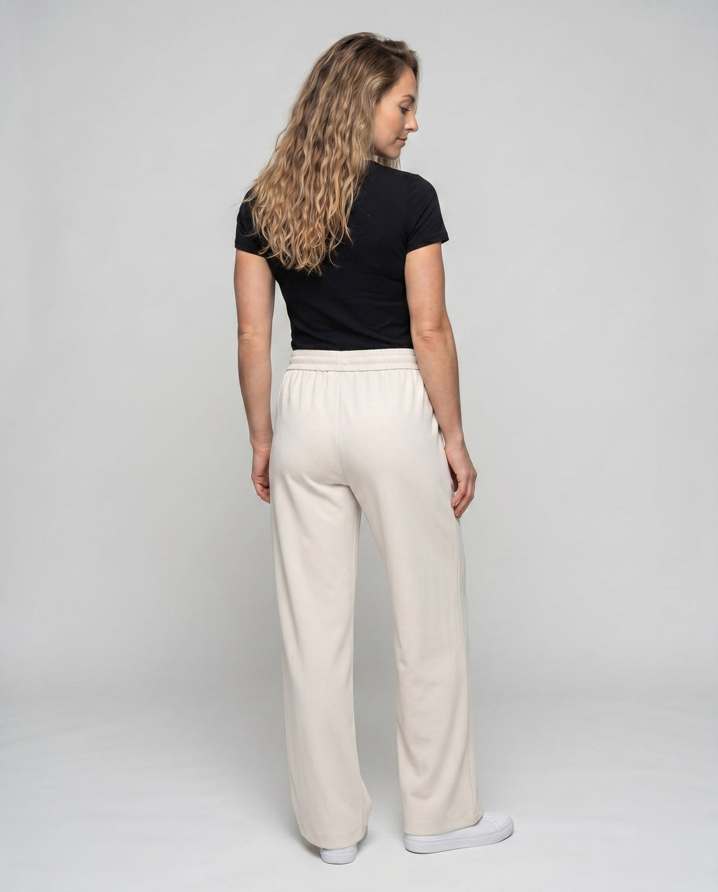 Women's wide lounge pants with elastic waistband and trendy details - back view