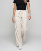 Women's wide lounge pants with elastic waistband and trendy details - lower body view