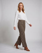 Ladies elegant tweed trousers with high waist and decorative buttons - lower body view