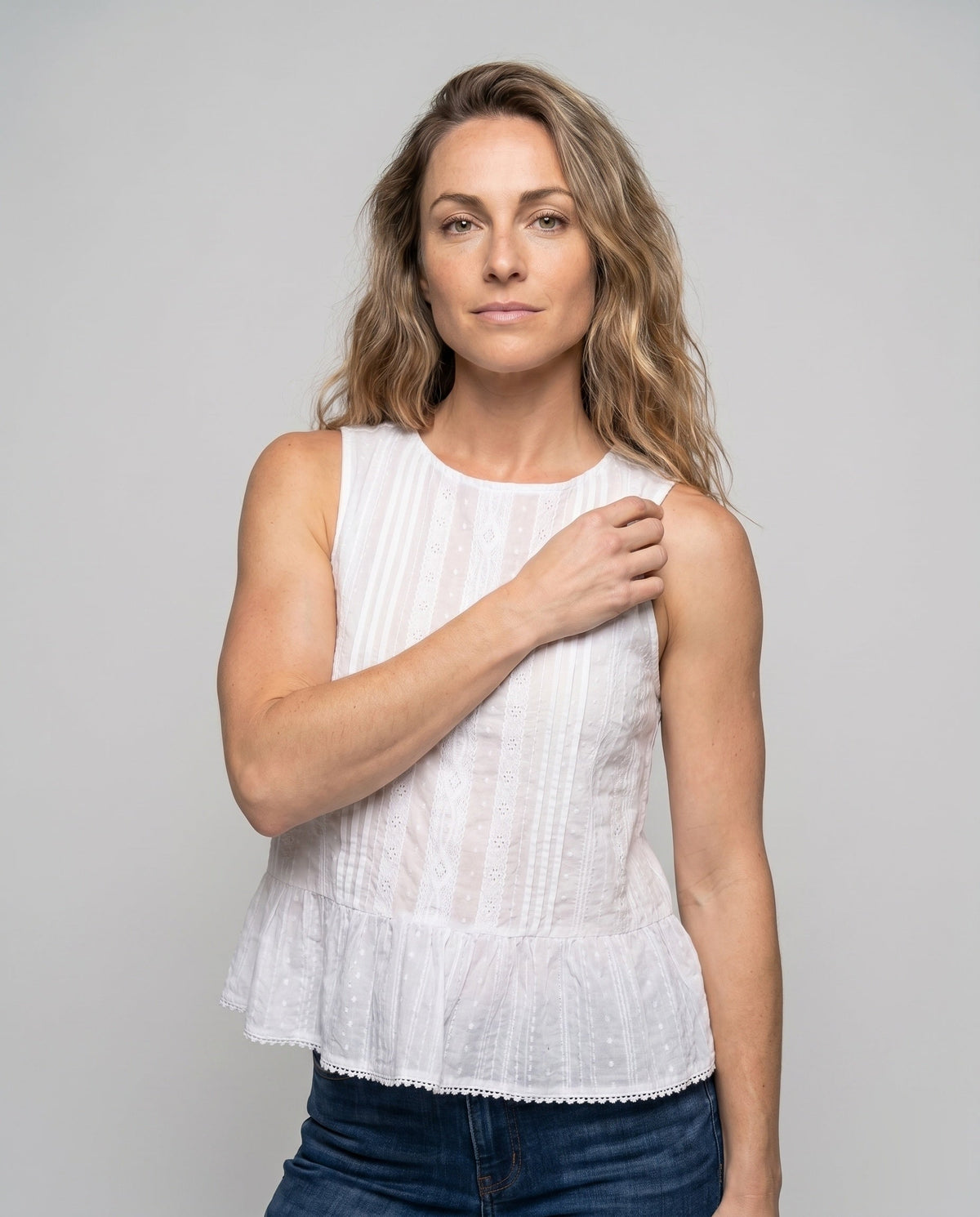 Women's airy blouse top with playful ruffle - upper body view