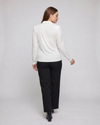 Ladies elegant long sleeve shirt with sophisticated wrap neckline and wide pants - back view