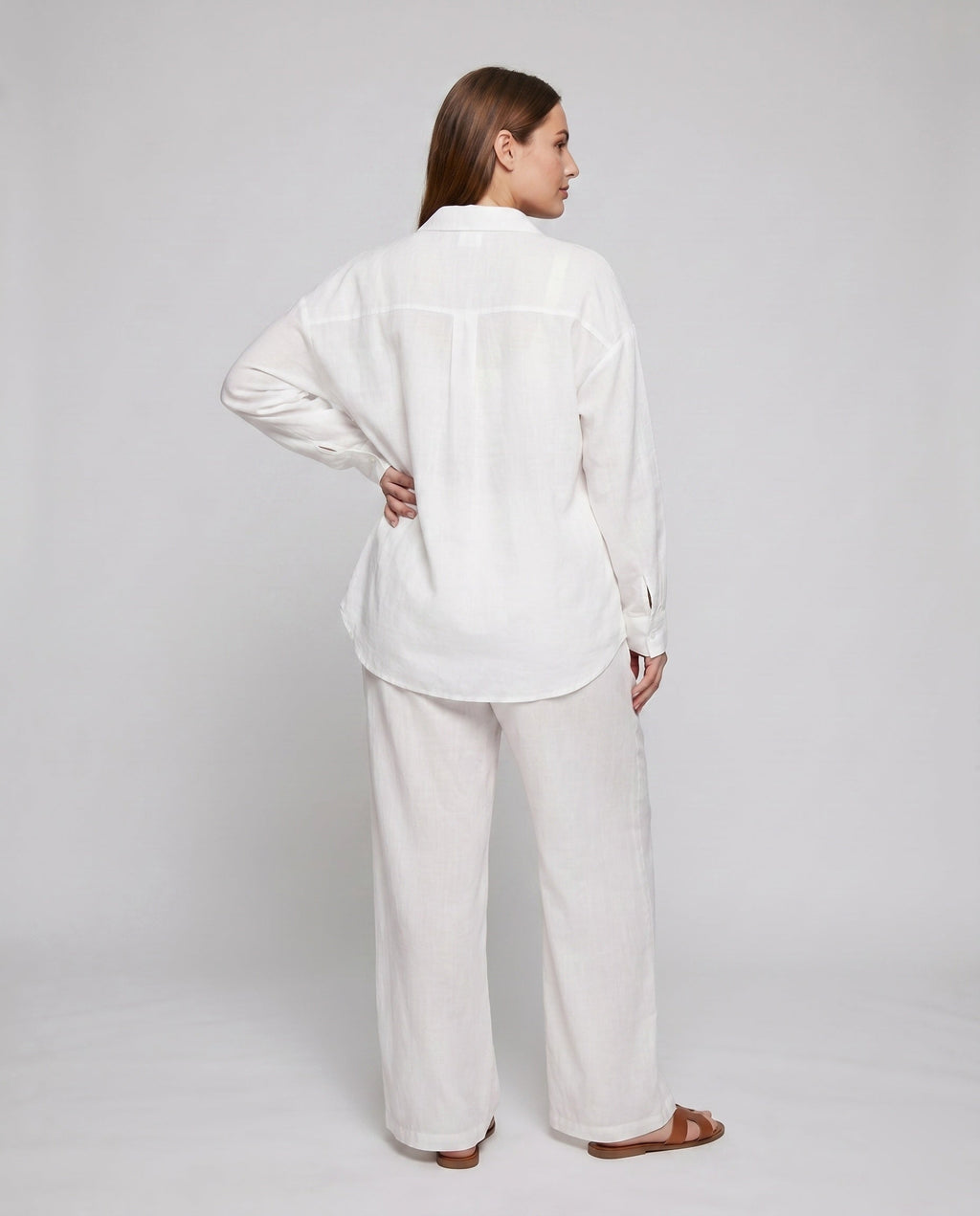 Ladies elegant, airy two-piece set with classic shirt and wide trouser leg - back view