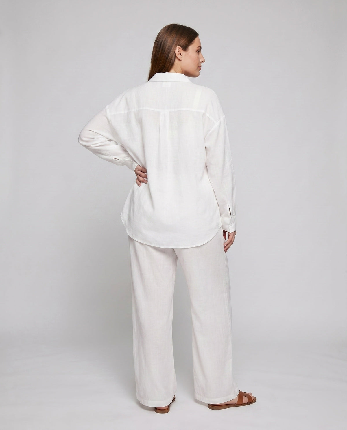 Ladies elegant, airy two-piece set with classic shirt and wide trouser leg - back view