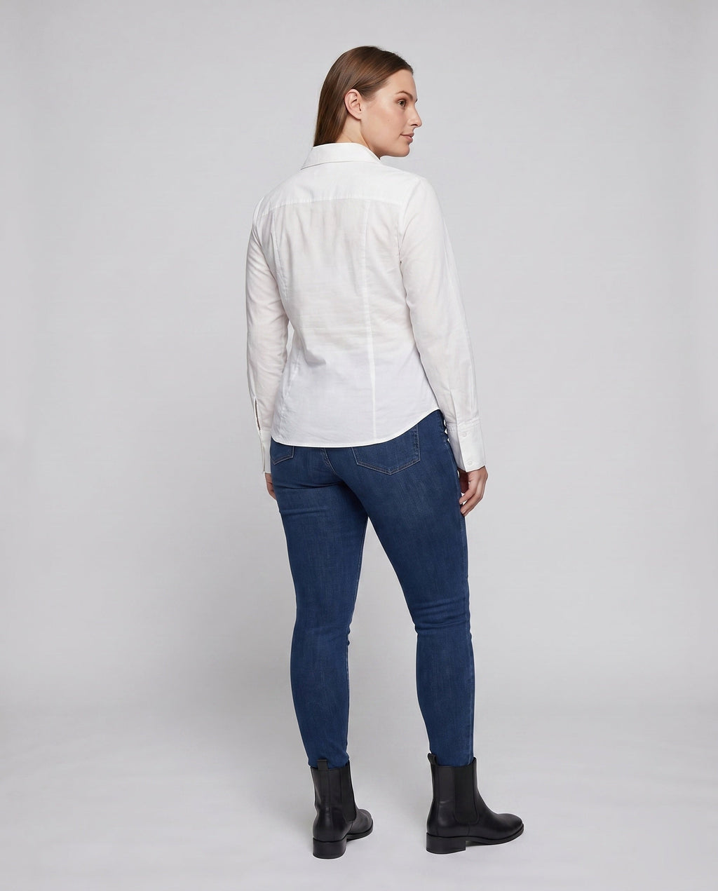 Women's classic blouse shirt with ruffle details and elegant V-neck - back view
