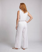 Women's casual and elegant set consisting of a sleeveless top and wide-cut pants - back view