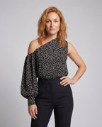 Ladies asymmetrical blouse shirt with puff sleeves - upper body view