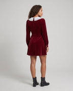 Women's dress with decorative buttons and voluminous sleeves - back view