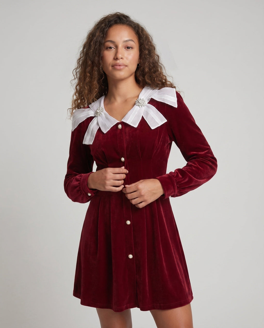 Women's dress with decorative buttons and voluminous sleeves - upper body view