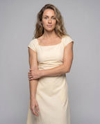Women's dress with elegant ruffles and figure-hugging cut - upper body view