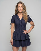 Women’s dress with ruffle details and flattering V-neck - upper body view