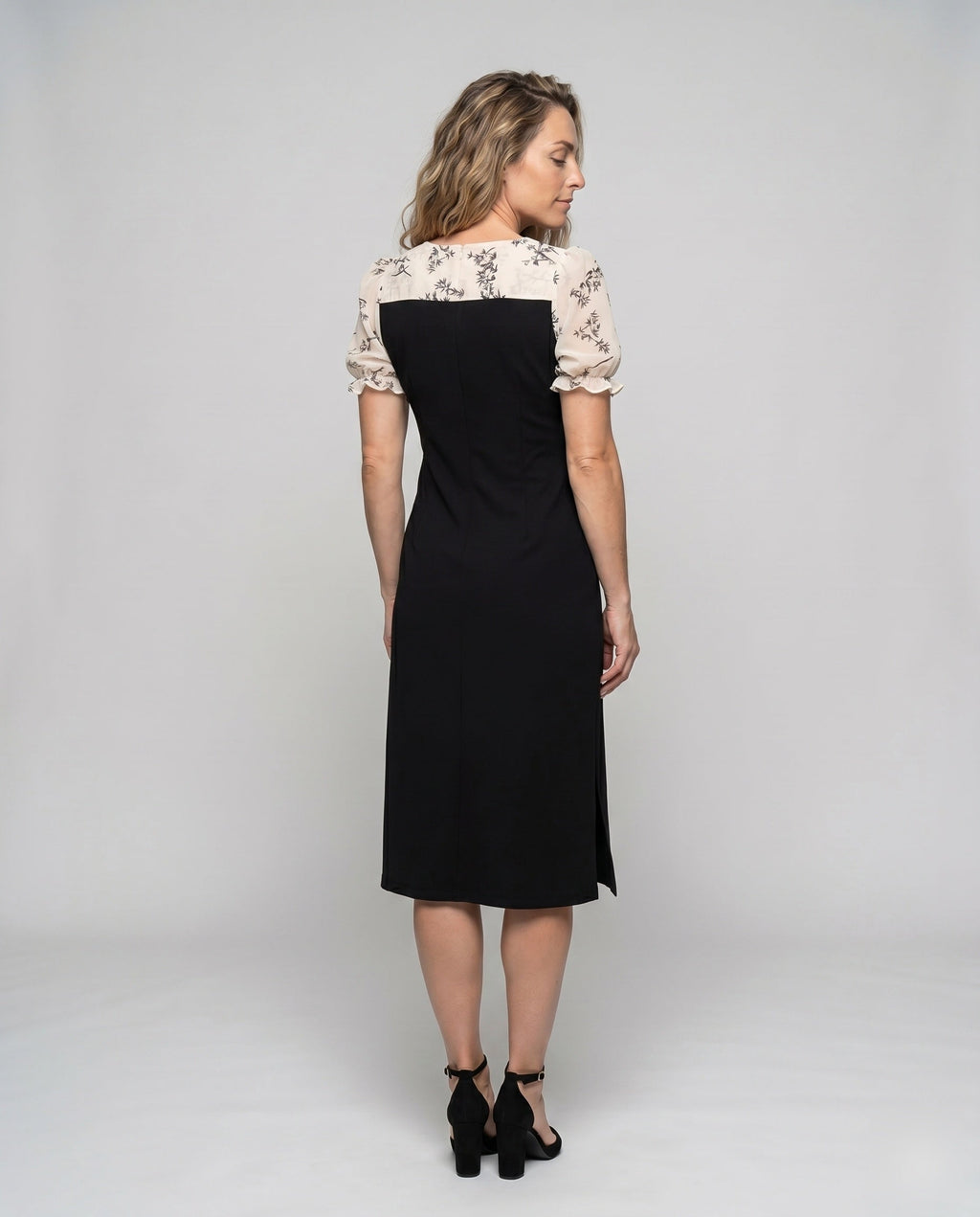 Women's dress with transparent puff sleeves and side slit - back view