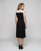 Women's dress with transparent puff sleeves and side slit - back view