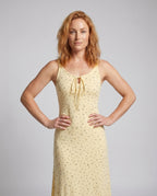 Women's long sleeve dress with floral details and adjustable straps - upper body view