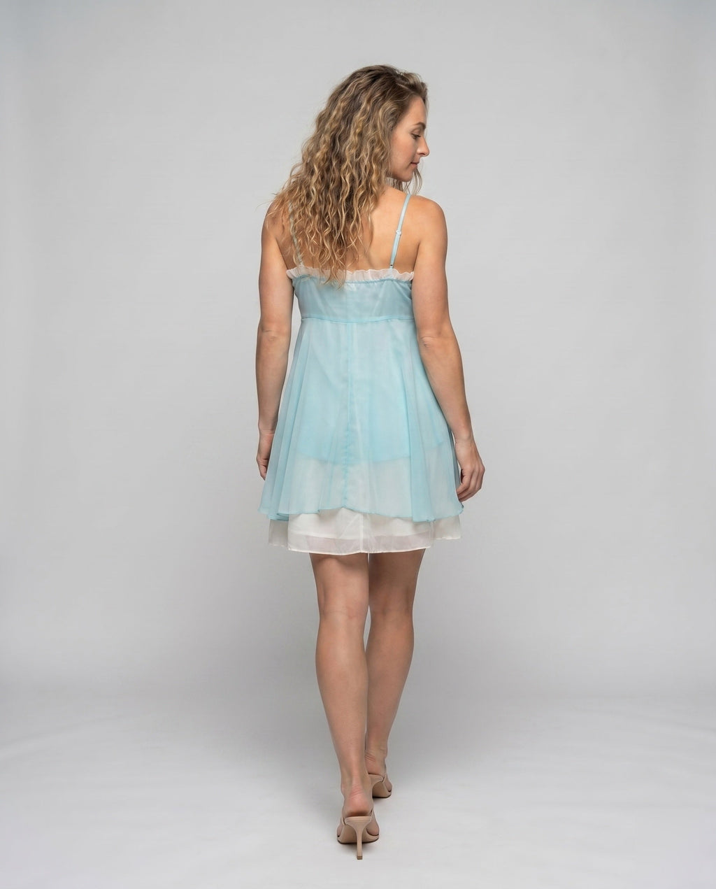 Women's airy chiffon dress with playful ruffle detail and narrow straps - back view