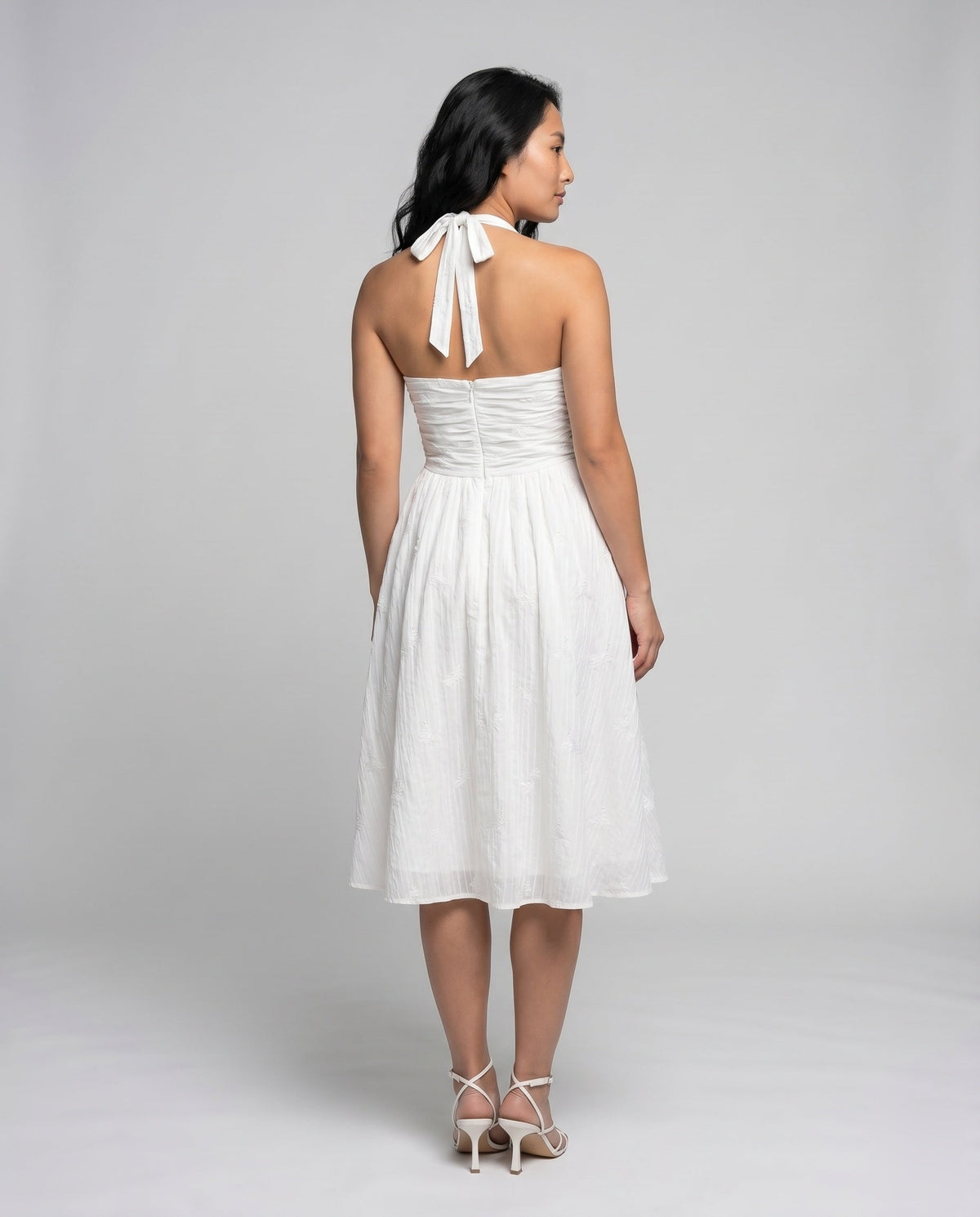 Ladies' maxi dress with elegant gathered top and flowing skirt - back view