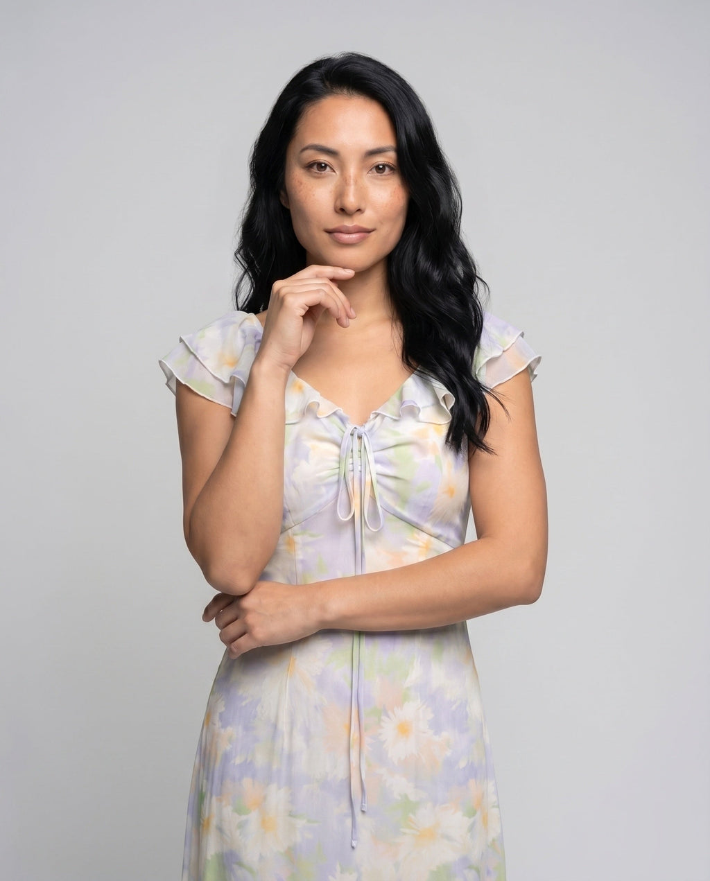 Women’s maxi dress with floral pattern and light chiffon neckline - upper body view
