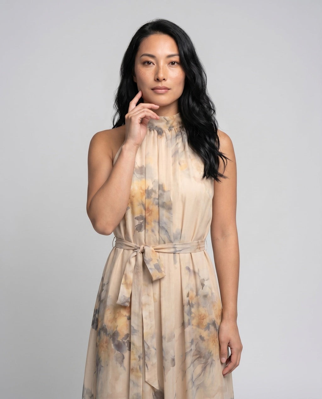 Women's maxi dress with floral accents and elegant halter neckline - upper body view
