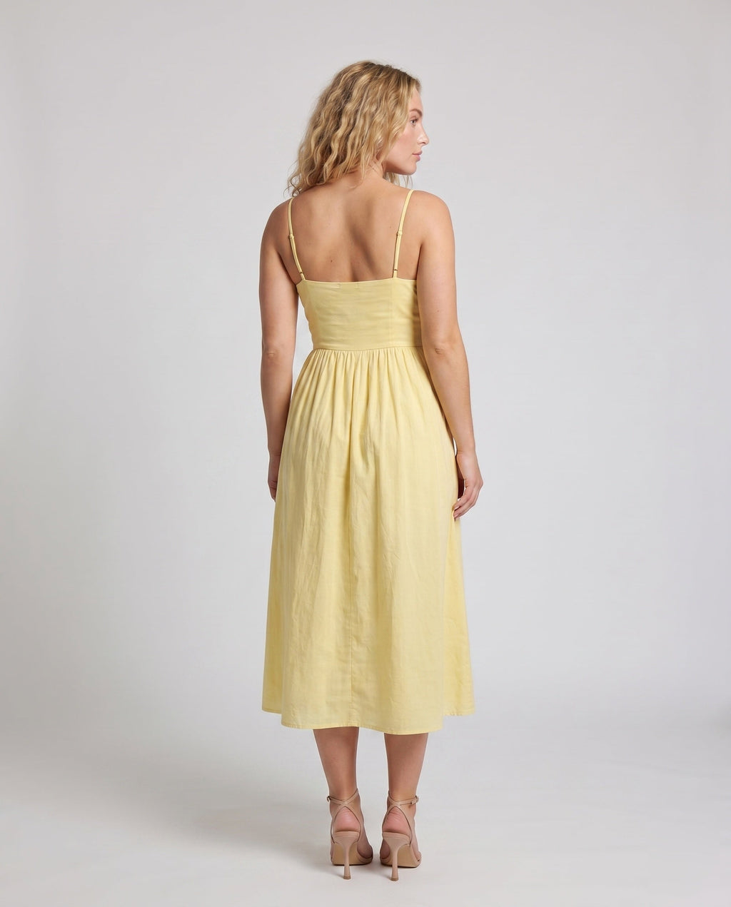 Women’s maxi dress with off-the-shoulder silhouette and flowing cut - back view