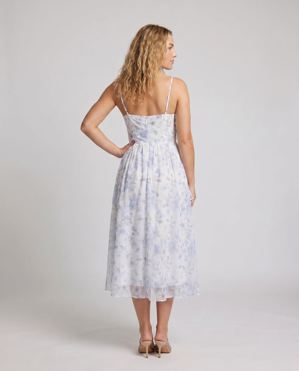 Ladies Maxi Dress with delicate ruffles and flowing fabric - back view