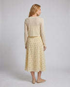 Women's midi dress with floral design and playful ruffles - back view