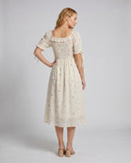 Women's Midi Dress with Delicate Ruffles and Nostalgic Pattern - back view